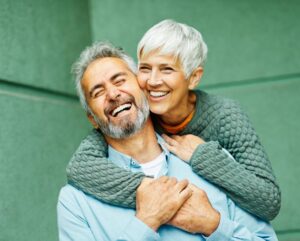 Smiling mature couple with attractive teeth